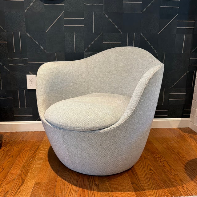 The Lina Swivel chair from DWR was one of our first furniture purchases over 6 years ago - we bought two but only have...