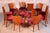 This magnificent and characteristically shaped set of twelve Art Deco chairs, dating from the 1940s in Czechoslovakia,...