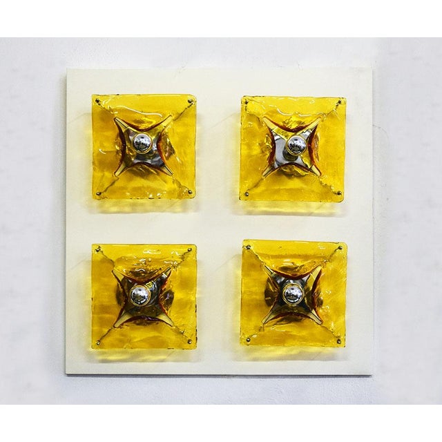 Large Mazzega Murano 1970s wall sconce. 4-light wall sconce on white lacquered wood panel. Chrome-plated supports with...