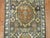 Very narrow and long one of a kind Persian Heriz runner. In greens, browns and blue predominant accents. 2'3'' x 14'2''