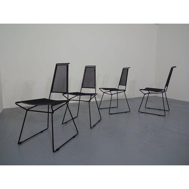 Set of 4 metal chairs. Design by Rolf Rahmlow (1954-2002) from the 1980s. Slight paint wear in some places. I have...