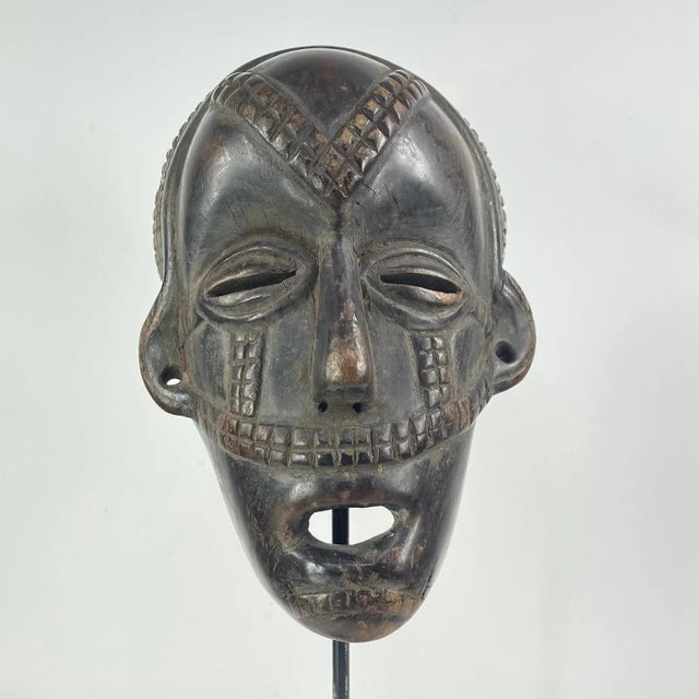 African Early 20th Century Tabwa Wood Mask with Awl Holes For Sale - Image 3 of 6