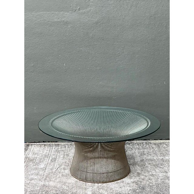 This Warren Platner glass and steel coffee table presents the unmistakable sculptural silhouette of the designer’s...