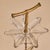 A French freestanding catchall in the manner of Maison Baguès from the 1950s, crafted in gilt bronze with a bamboo motif....