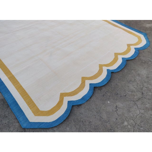 Handmade Cotton Vegetable Dyed Scalloped Edge Rug Light Yellow With Yellow and Teal Blue Border - 9'x12' For Sale - Image 6 of 11