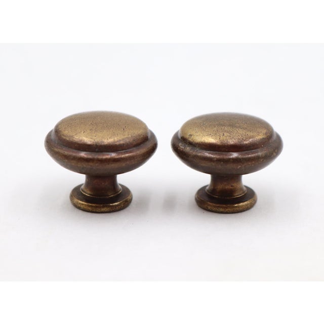 Vintage Classic style plain patina brass finish steel cabinet or drawer pulls. Mounting screws are included. Good...