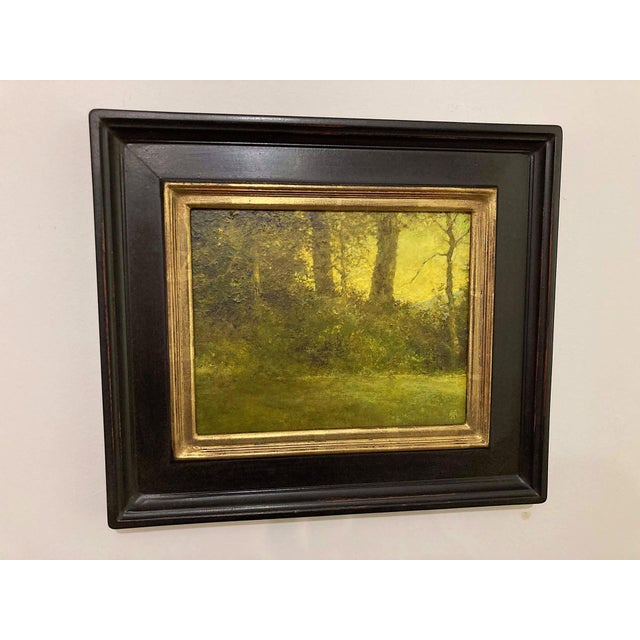 This oil painting captures a serene upstate landscape bathed in warm, golden light, evoking a tranquil atmosphere. The...
