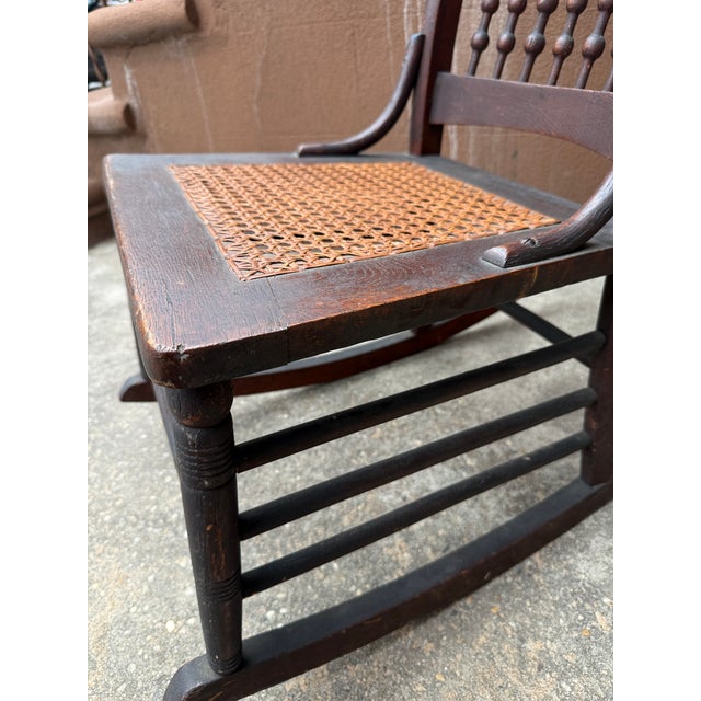 Wood Early 20th/Late 19th Century Victorian Rocking Chair With Spindle Back and Cane Seat For Sale - Image 7 of 12