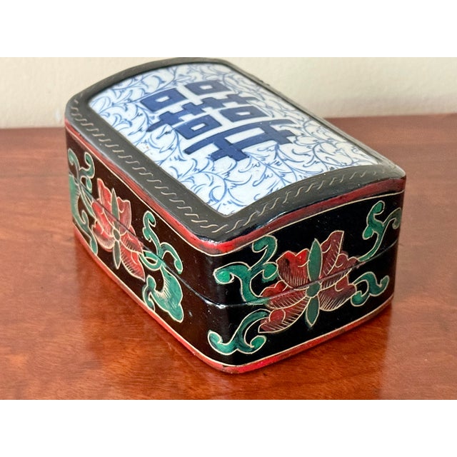 Large size black lacquer hand-decorated box incorporating a broken piece of Chinese antique porcelain. These shard boxes...