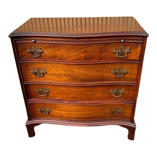 Early 20th Century Antique Flame Mahogany Serpentine Bachelor’s Chest. For Sale