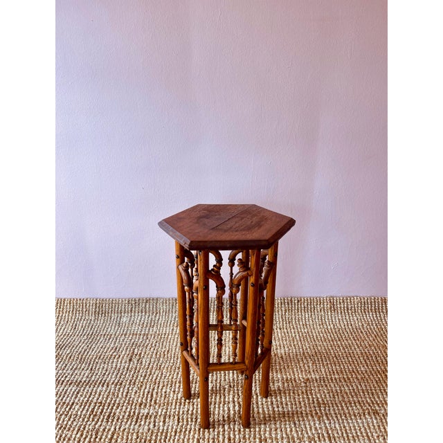 Superb, hexagonal oak, stick and ball side table with fantastic wood details and metal joinery attributed to Liberty & Co,...