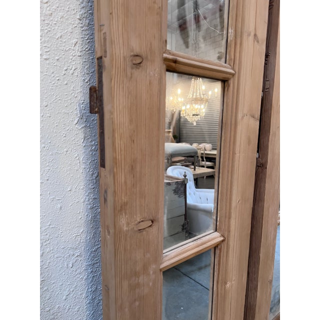 Beautiful collection of French wood Doors with mirrors, can be use as a wall decor or room divider.