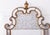 A striking Lillian August for Hickory White neoclassical wall mirror, featuring an elegant antiqued-gold finish, bead...