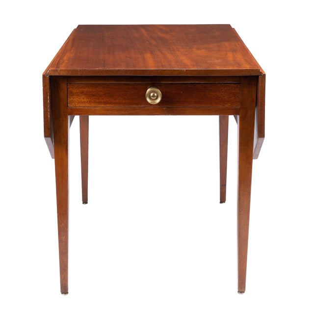 A Federal-era Massachusetts Hepplewhite drop-leaf Pembroke table, 1790-1810, in Honduran mahogany with a wide, single-...