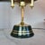 Elegant Swedish table lamp inspired by the classic banker’s lamp design, crafted from polished brass and enamelled metal....