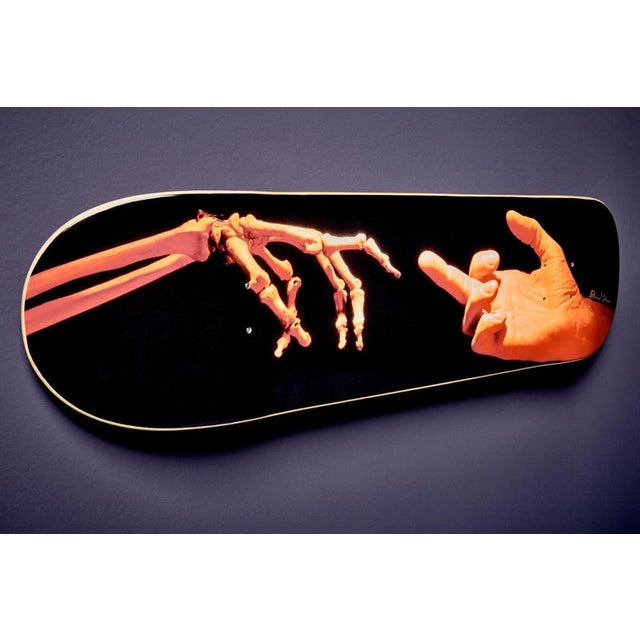 This limited edition skateboard deck by “Original in Berlin” features a striking and provocative photograph by legendary...