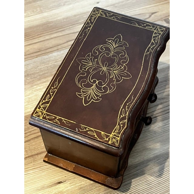 Vintage jewelry box which is also a music box.