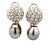 A refined blend of elegance and brilliance, these drop earrings are crafted in 18K white gold and feature lustrous South...
