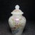 A lovely small Chinese Peking glass covered jar. The milky white glass is beautifully hand-painted with a vibrant pheasant...
