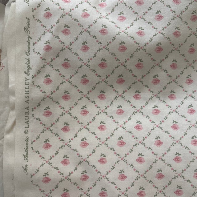 86 inches of this beautiful vintage Laura Ashley fabric. It appears to be cotton and it’s rather sturdy. The background is...