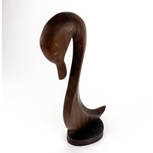 Hand made in the Philippines, this tall and graceful wood work of art will add beauty and style to your space. Uses a...