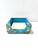A striking vintage Chinese cloisonné memo holder featuring a vibrant turquoise enamel ground decorated with delicate lotus...
