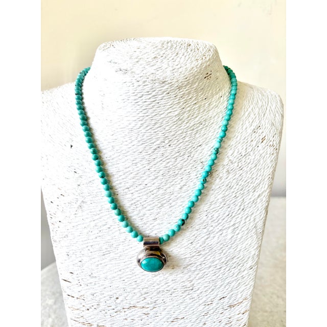 Lovely turquoise Beaded necklace with sterling silver and turquoise pendant designed by Matthew Izzo.