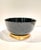 Contemporary decorative bowl with chinoiserie style. It is in glossy black with scallop edges. It comes with a gold leaf...
