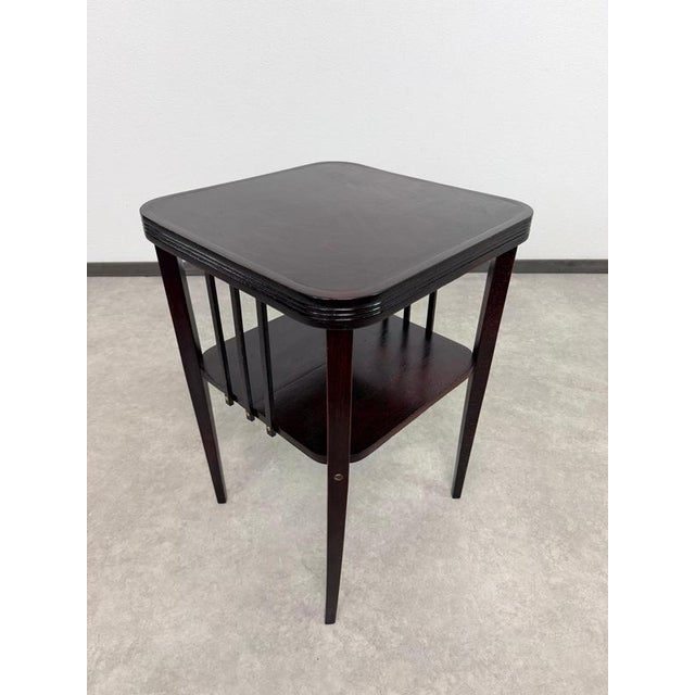 An iconic Austrian Vienna Secession bentwood side table or plant stand model No. 412, designed by the legendary architect...