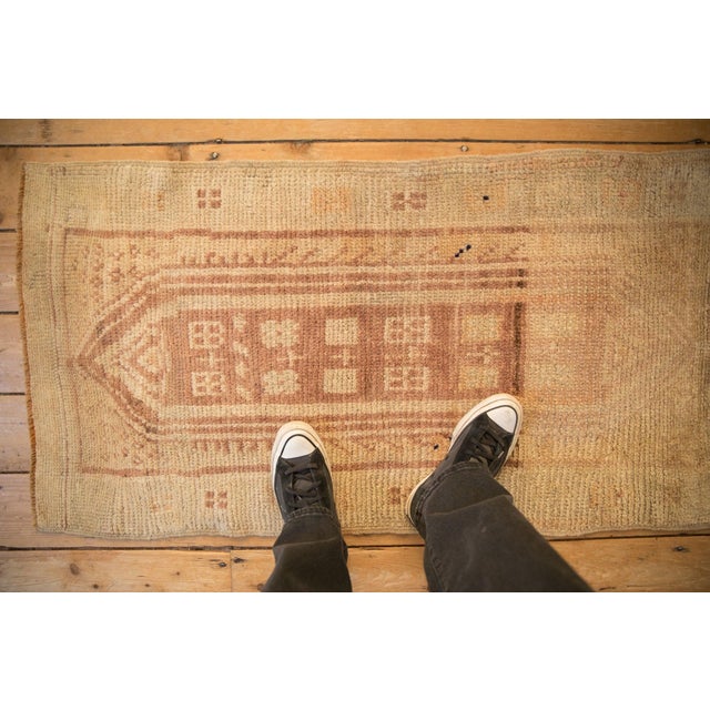 :: Elongated cartouche-like concentric center medallions with interior geometric floral blossom renderings wrapped by...