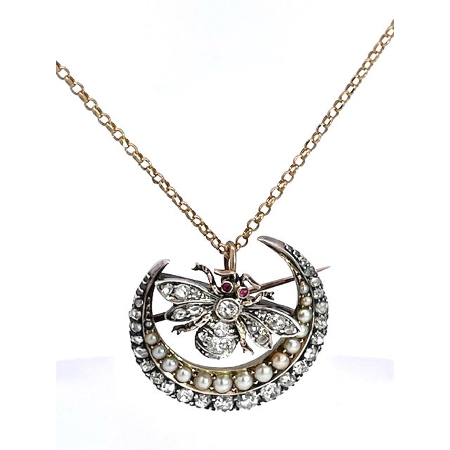 This Victorian brooch or pendant is unique as it is beautiful. This Crescent brooch has a bumble bee sitting on the...