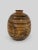 A striking example of American studio woodturning, this hand-turned vessel is crafted from solid white oak with a dramatic...