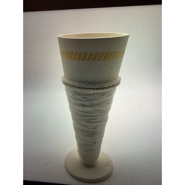 Elegant signed Emilio Robba decorative art vase featuring a distinctive sculptural silhouette, textured white finish, and...