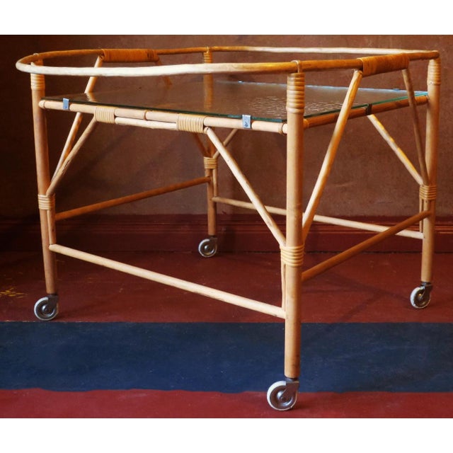 Bamboo and frosted glass finely-shaped serving trolley, 1950s-1960s. Very good condition with minimal signs of age and use.