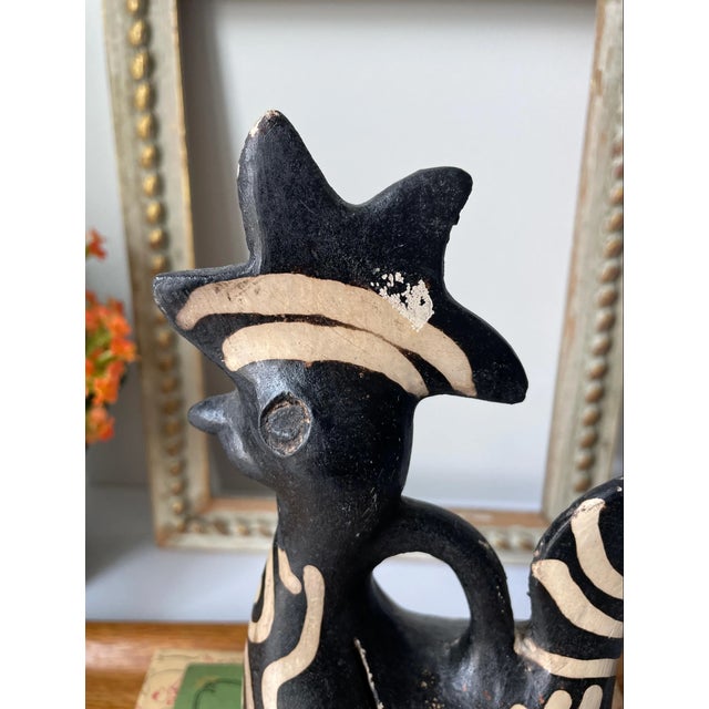 A rare mid‑century Lenca pottery rooster bank from Honduras, crafted in stoneware and decorated with traditional...
