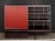 Antonio Citterio for B&B Italia "Domus 03" Wall Unit, wood and steel frame with red acrylic sliding door opening to multi-...