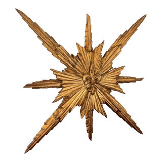 Mid Century Italian Parcel Gilt Palladio Carved Wood Sunburst Decorative Wall Sculpture With Fleur De Lis Detail For Sale