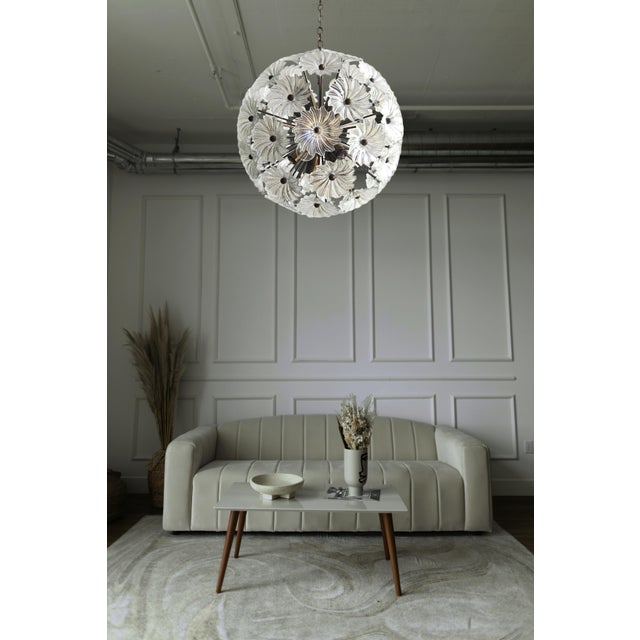 Sputnik space age Italian vintage crystal chandelier made by 51 transparent crystals in a burnished brass metal frame....