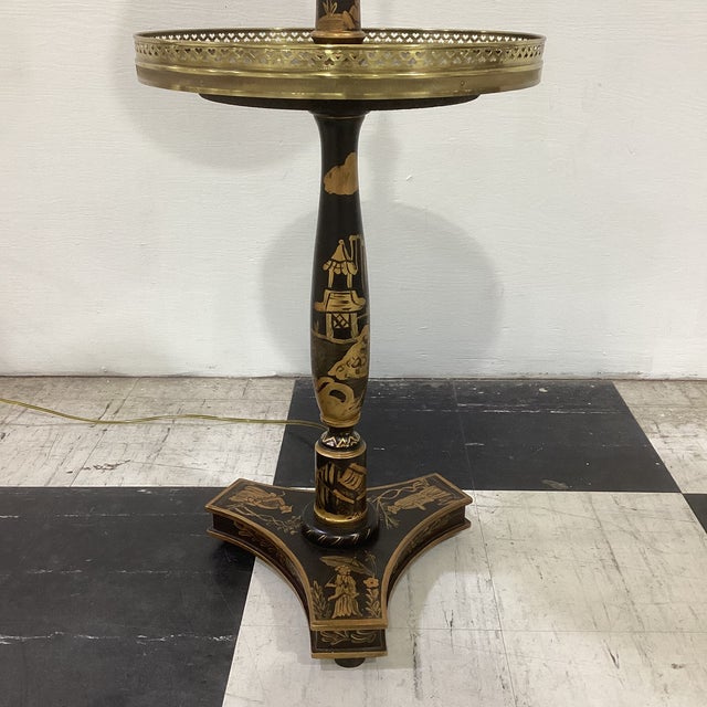 Elegant and highly functional Frederick Cooper floor lamp featuring a classic Chinoiserie-inspired black lacquered column...