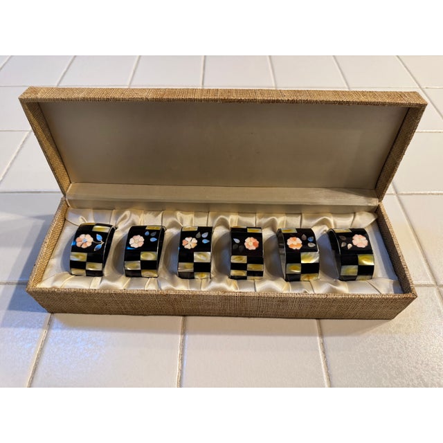 Add a touch of timeless elegance to your table setting with this exquisite set of six vintage napkin rings. Each piece...