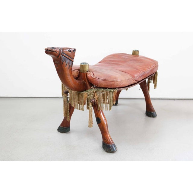 Vintage Egyptian Camel Saddle Stool in Leather and Wood, 1950s, in Very Good conditions. Designed 1950 to 1959