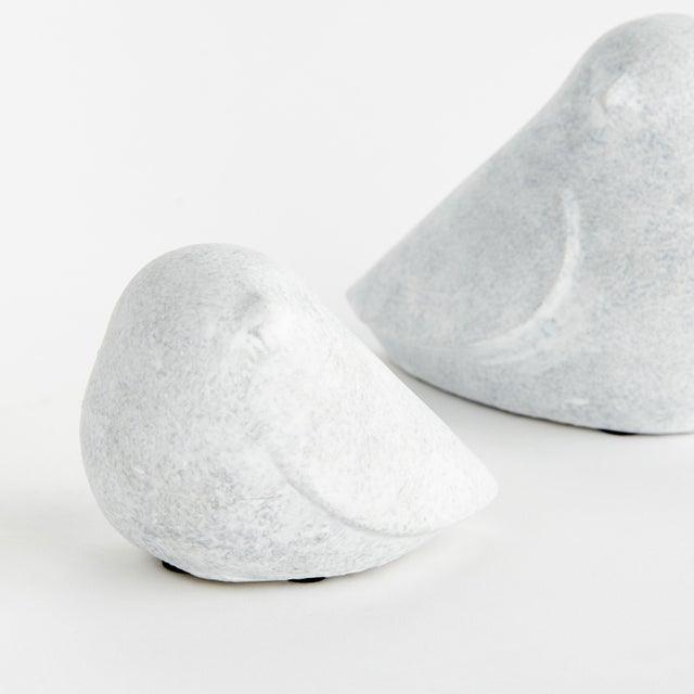This sweet little duo of modern bird sculptures is made of concrete and finished in aWhitewash. A charming accent for the...