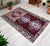This hand-knotted vintage area rug originates from Southeastern Anatolia, meticulously crafted during the 1970s. Featuring...