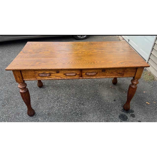 Antique Oak library table with 2 drawers. Made early 1900's when Oak was all the rage. Nice size can be used as kitchen...