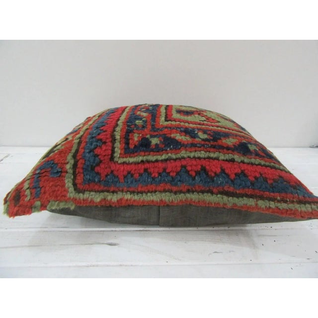 This is a pillow cover made from a vintage kilim rug. The piece was properly washed and ready to use. Pillow inserts not...