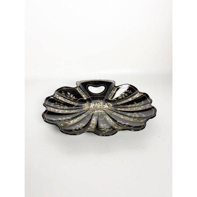 Elegant french napoleon iii papier-mâché catchall dating from the late 19th century. The piece features a deep black...