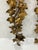 This pair of 50’s vintage sconces was made in Italy The tole leaves are applied to an iron frame The gold leaf finish has...