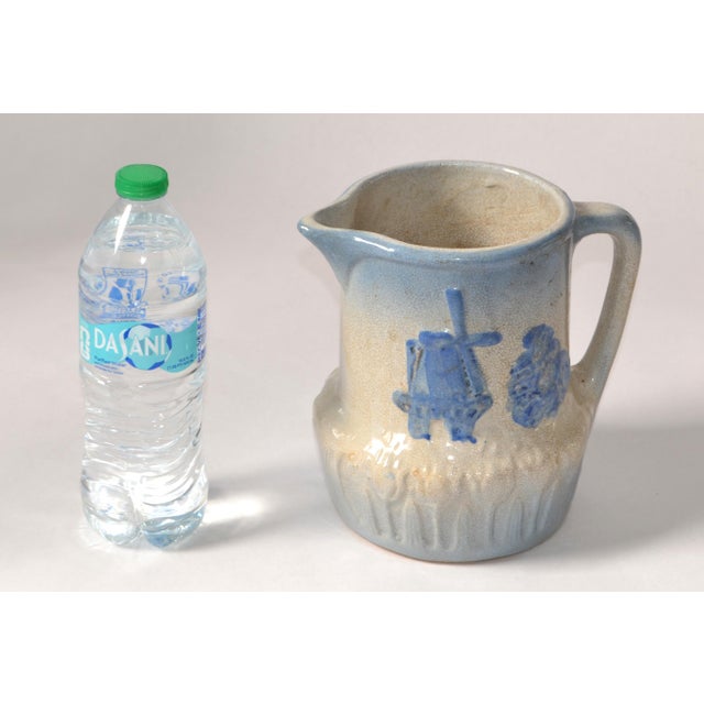 AK Dutch Delftware Early 20th Century Dutch Windmill Tulip Motiv Blue Beige Stoneware Pitcher For Sale - Image 4 of 14