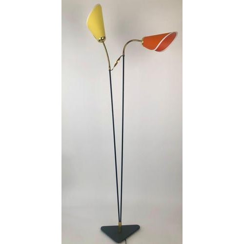 A wonderful Italian floor lamp from the 1950's. Simple in design with excellent craftmanship . The lamp sits on three...