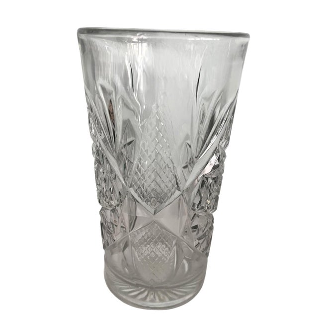 This is a beautiful elegant, and classic Hollywood Regency vase. It is cut crystal. Perfect piece to display as is, with...